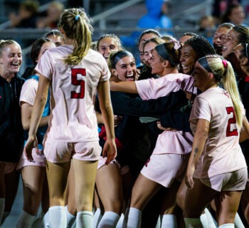 Rutgers women's soccer celebrates a goal.