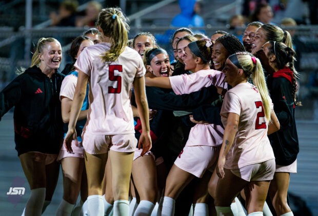 Rutgers women's soccer celebrates a goal.